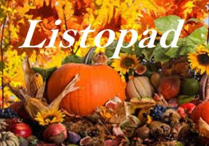 Napis listopad na tle dyni i kolorowych liści